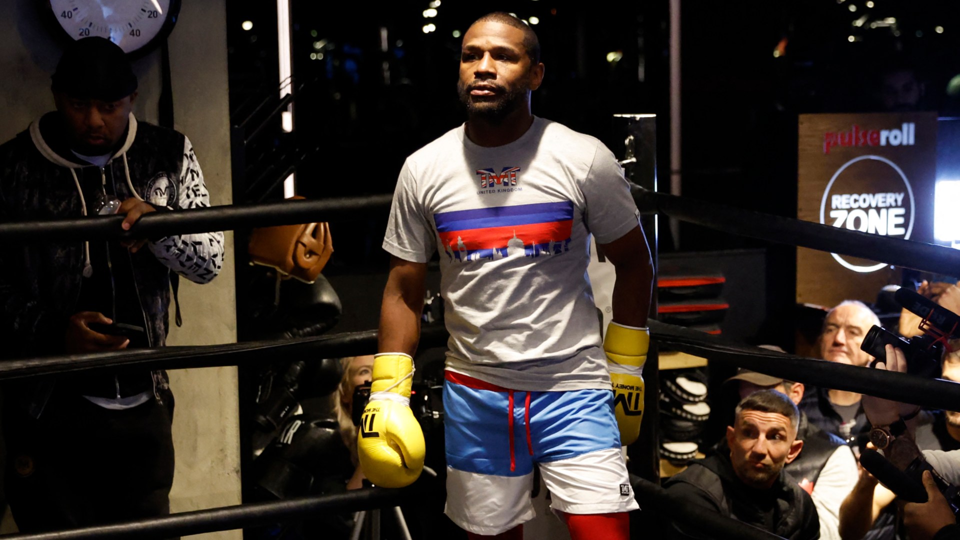 Floyd Mayweather wearing boxing gloves during training in 2026
