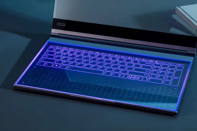 La laptop con monitor transparente tiene un teclado plano de cristal