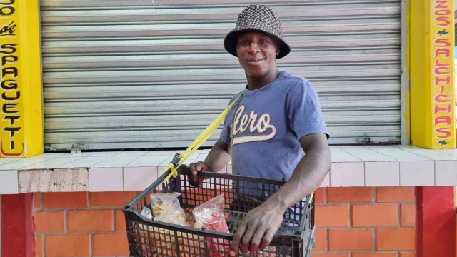 Al Benson, migrante haitiano